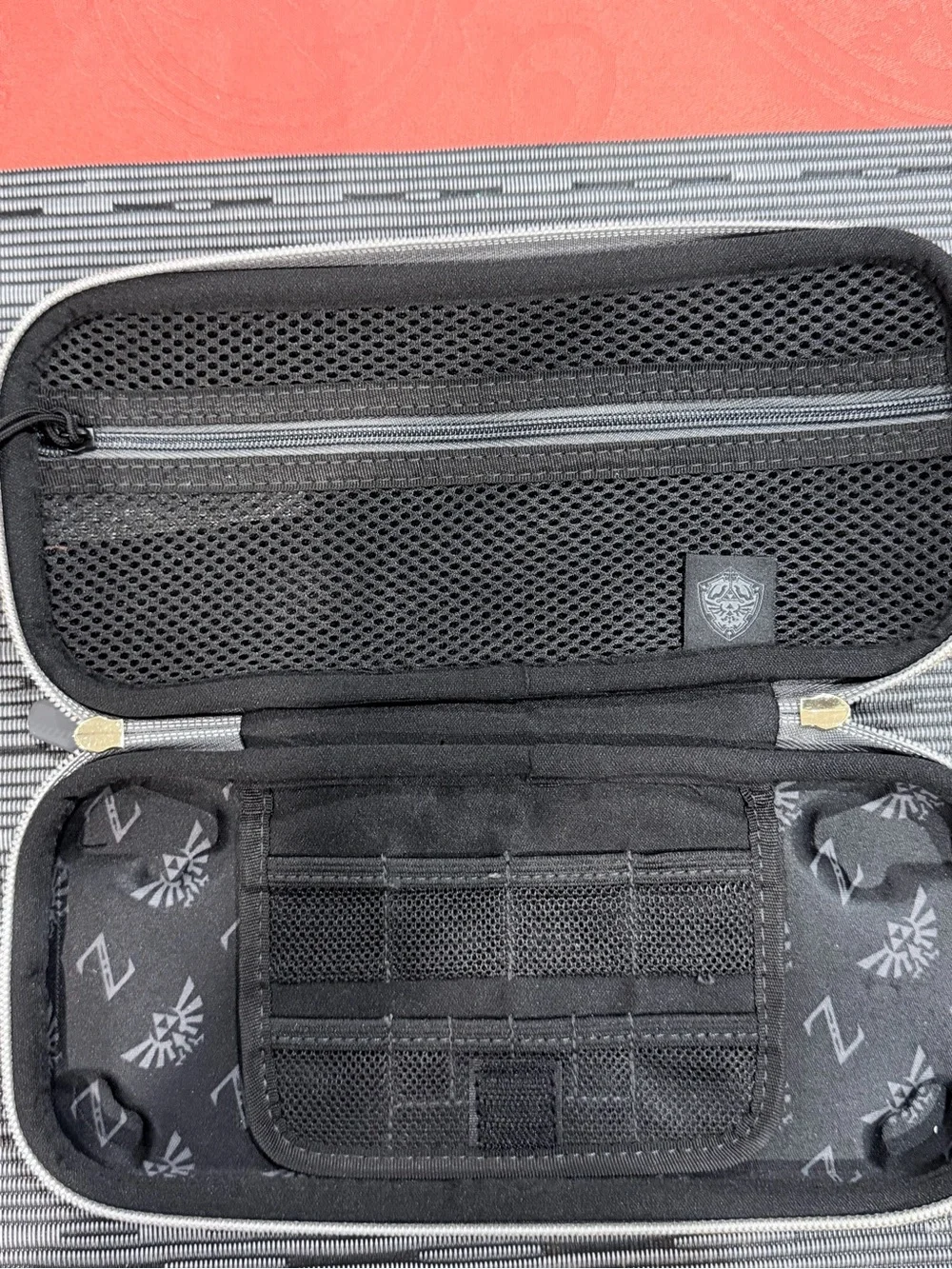 Black Travel Case with Gold Emblem